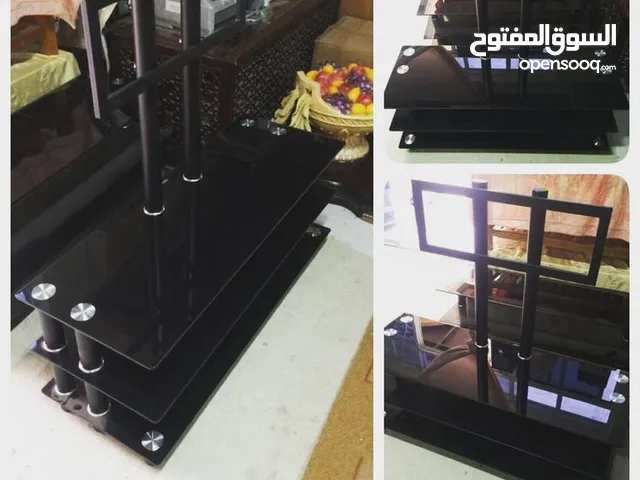 طاولة تلفاز زجاج