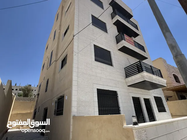 أربع شقق طابقيه للبيع مساحة كل شقة 148 متر في ماركا الشمالة قرية خالد بن الوليد