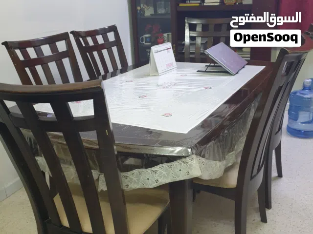 Wooden table with 6 cushioned chairs Ro 35