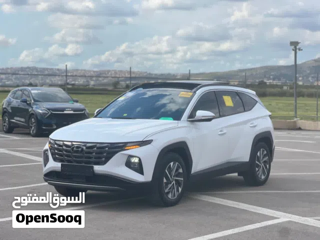 توسان هايبرد فل مع فتحة سقف بانوراما ترخيص 2023 عداد 26 سعر حرق