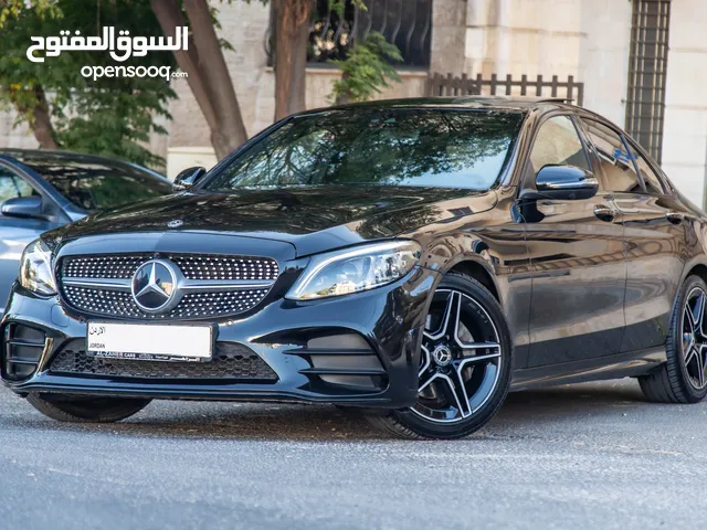 Mercedes C200 2019 Amg kit mild hybrid Night Package السيارة وارد المانيا و قطعت مسافة 91,000 كم