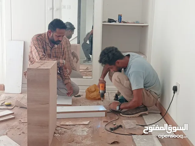 carpenter worker furniture repairing cabinet new make and also spray paint door and 24 HR services