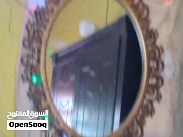 مرآة حائط مزخرفه