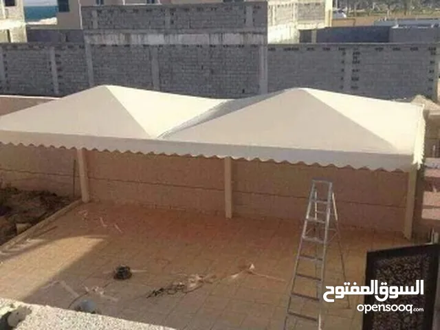 ورشة كفاءات للبيوت الجاهزة مظلات معلقه بجميع انواعه كرفانات