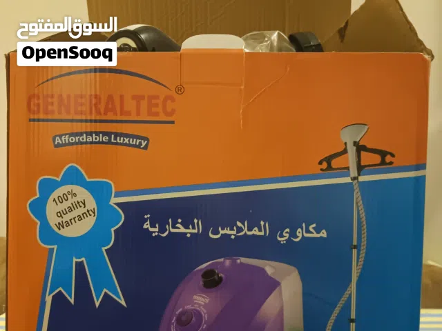 مكواة ملابس البخارية جديدة