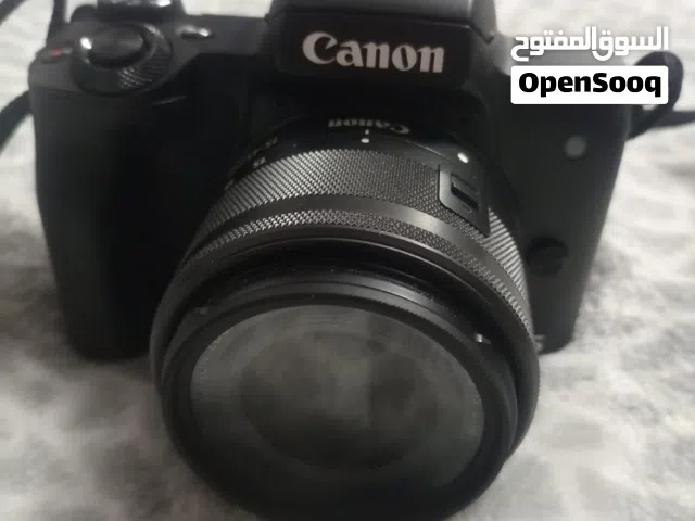 كاميرا كانون M50 استعمال خفيف + ترايبود + كارت ميمورى + فلتر + شنطة