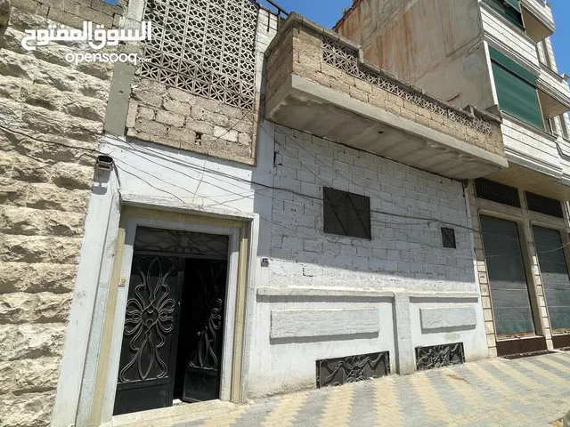 بيت عربي + قبو على الشارع الرئيسي