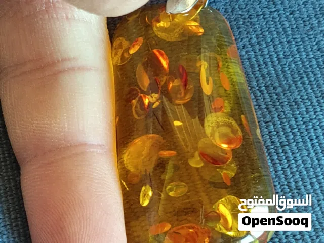 فقط قطعة واحدة: قطع كهرمان بلطيقي حقيقي اصفر شفاف بنسبة 100% مصقول مع تعليقة قلادة