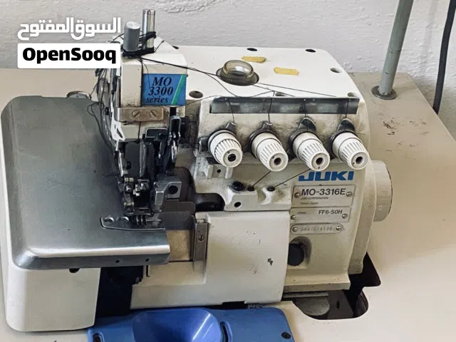 مكينه خياطه خمس خيطان