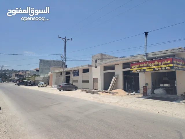 مخازن للايجار جنوب غرب جنين تقع على شارع رئيسي حيوي