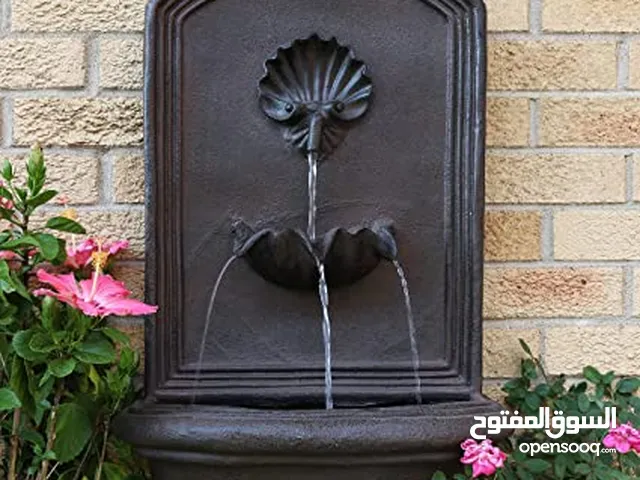 A water fountain attached to the wall