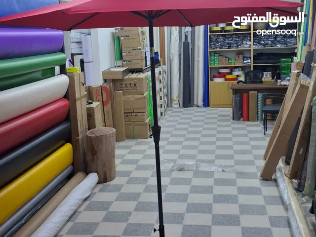 مظلات وحدائق خارجيه جميع الالوان والاحجام موجودين في ابو علندا والجلود جميع انواع الجلود والاقمشه