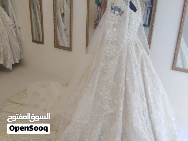 محل فساتين زفاف للبيع