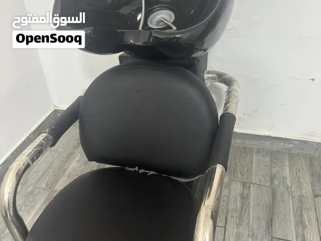 كرسي وحوض غسيل شعر