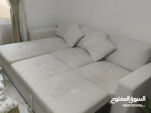 Elegant beige L-shape sofa bed
