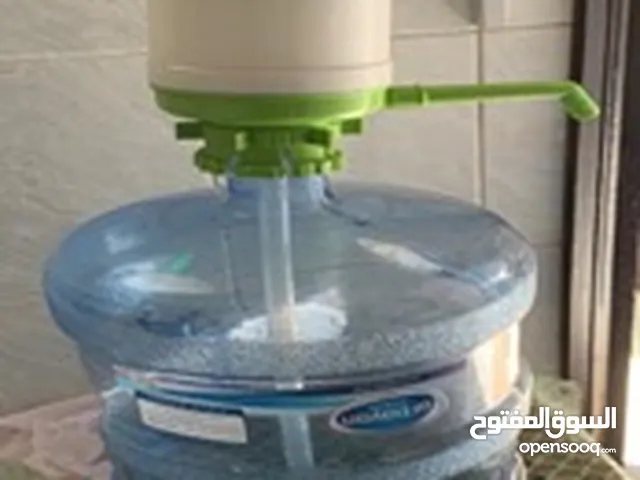 4 water bottles with water pump