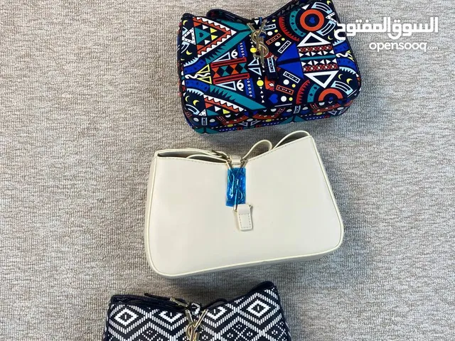 حقائب ايف سان لوران