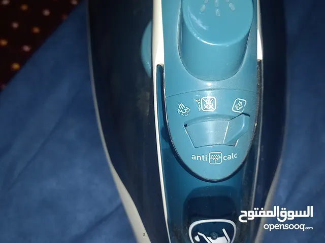 كاوية ملابس بخاصية البخار