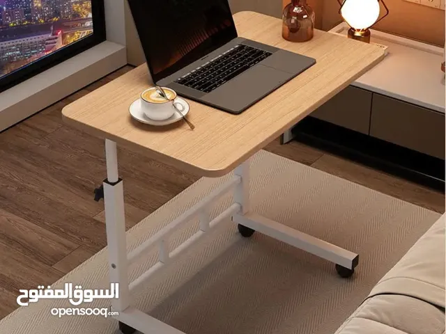 طاولة سرير متعددة الاستخدام – قابلة للتعديل بعجلات استمتع بالراحة والإنتاجية في مكان