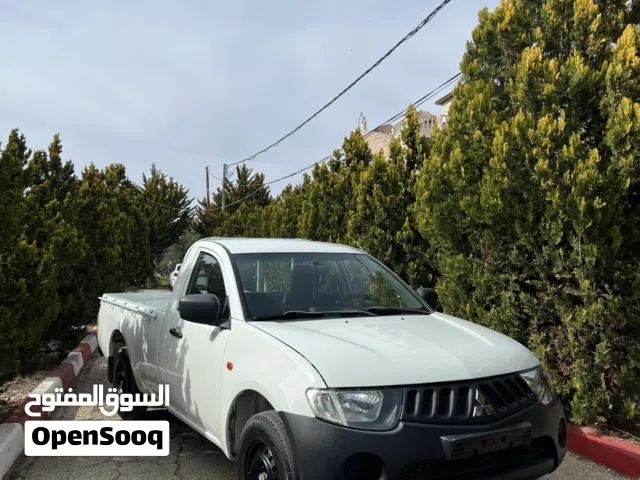 MitsubishiL200 بنزين شصي طويل