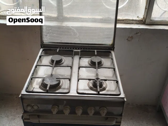 طباخ وتخم وبوفية وميز تلفزيون