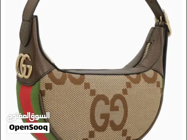 شنطة نسائية ستايل Dior Saddle – تصميم كلاسيك بنقشة CD