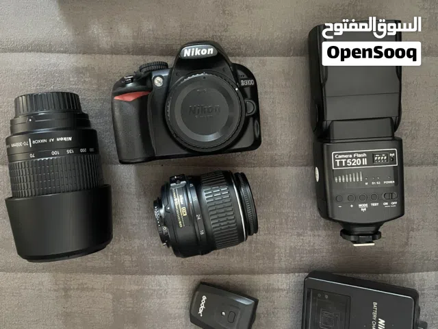 مع عدستان و ترايبود وملحقات اخرى Nikon D3100