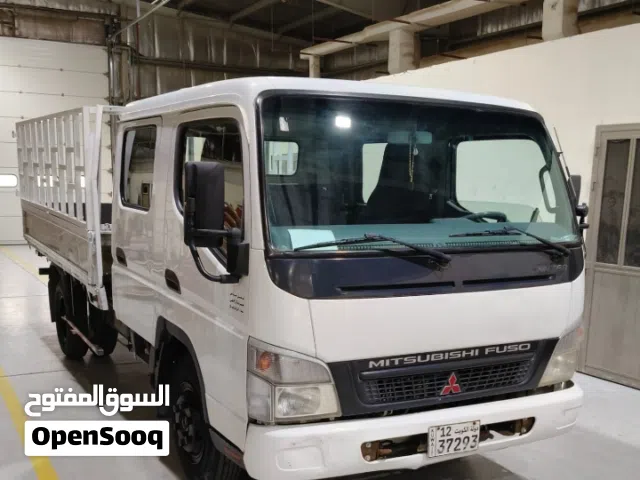 شاحنة ميتسوبيشي صندوقية مستعملة موديل 2014 للبيع - مركبة تجارية موثوقة
