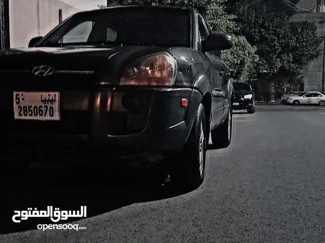 كتلايزر هونداي توسان