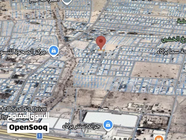 فرصه ارض ممتازه الصومحان خلف جراند سنتر ورامز للتسوق مستويه وسط البيوت.