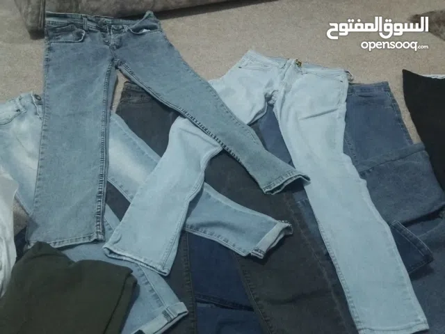 مجموعةبناطيل جينز مستعمله بحال الجديد