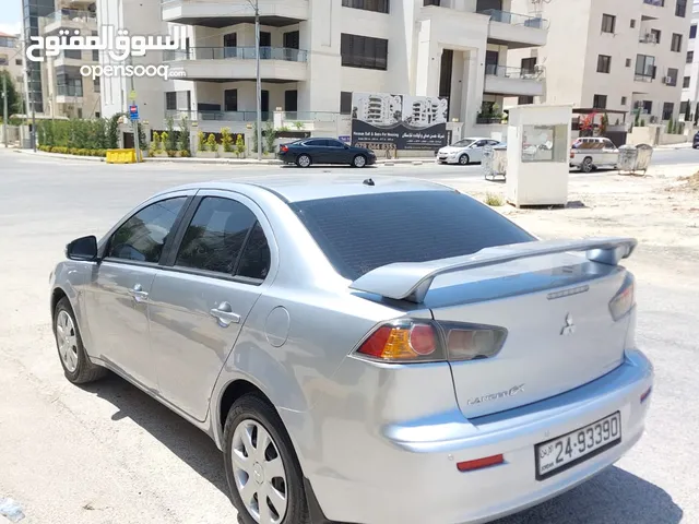 لانسر 2015 فحص كامل 7جيد بحالة الشركه يرجى قراءة الاعلان قبل الاتصال