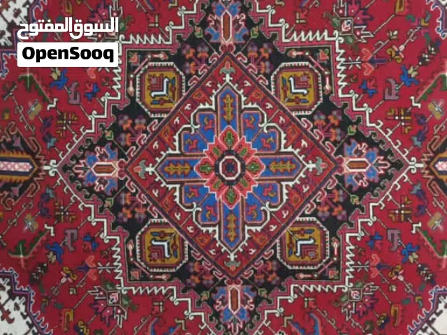 Handwoven carpet with Harris motif