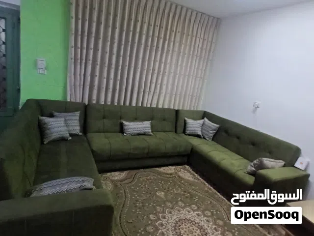 كورنر حرف U يتضمن صوفا بيد