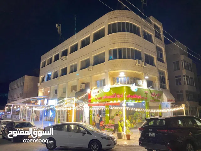 لقطة - مجمع تجاري للبيع في منطقة الشميساني موقع حيوي بدخل سنوي ممتاز -