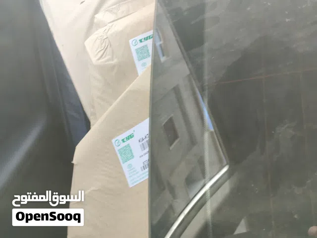 زجاج كيا كادينزا 2012 الاصلي