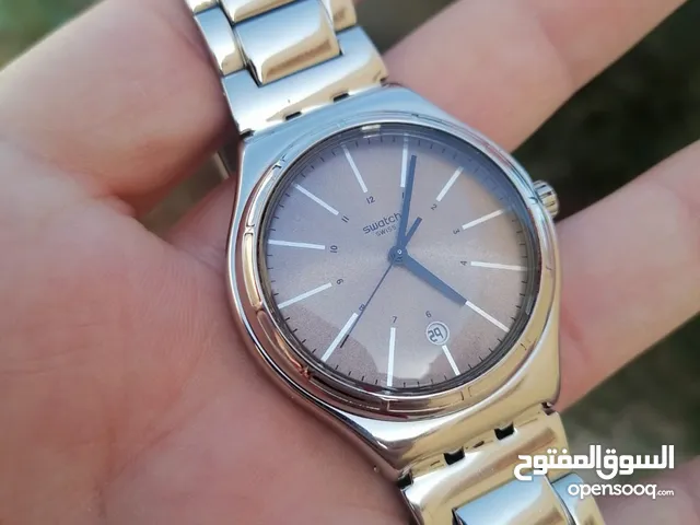 #SWATCH سواتش سويسري اصلي لومينوس شباك للتاريخ حجم 41 بحالة ممتازه 40 دينار