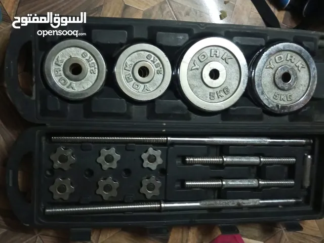 دنابل حديد مع بال استخدام شهر وكاله ما بصدو وزن 50كيله مش باوند