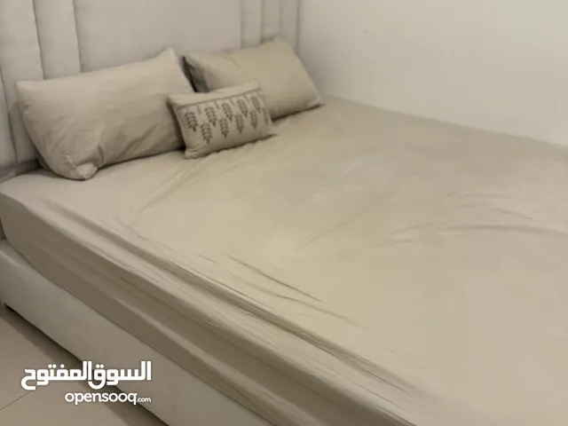 Modern Upholstered Bed with Vertical Headboard Design – Beige