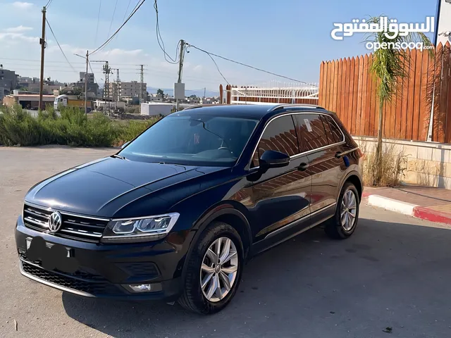 جيب تيجوان بنزين ماطور 2000 190hpصنع شهر6 2020 ولا غرام بوية ترخيص+تأمين شامل سنة كاملة لشهر 10/2026