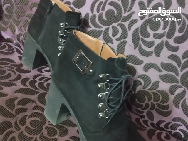 Black With Heels in Cairo
