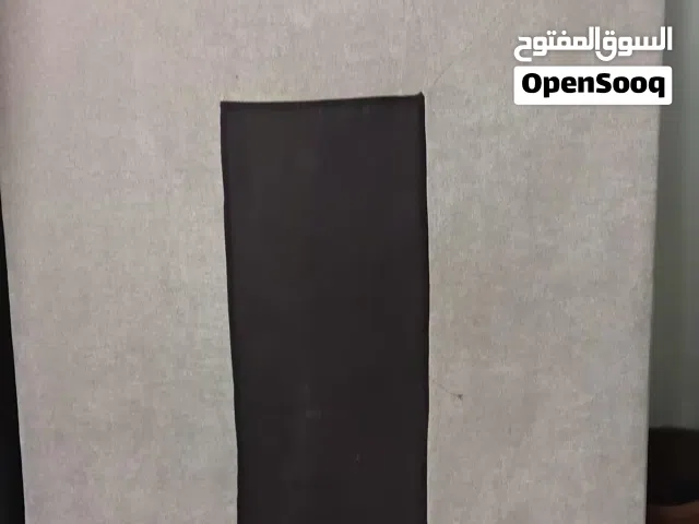 طاوله خشبيه او طبلية مبطنة