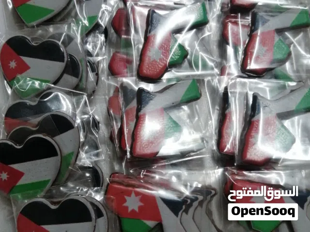رقائق الشوكولاته مطبوعة عليها العلم الاردني نفتخر يعلمنا