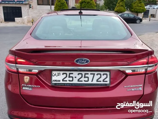 فورد فيوجن تيتانيوم فل الفل بفتحه لون خمري مميز فحص 3 جيد بسعر مغري قابل للبدل