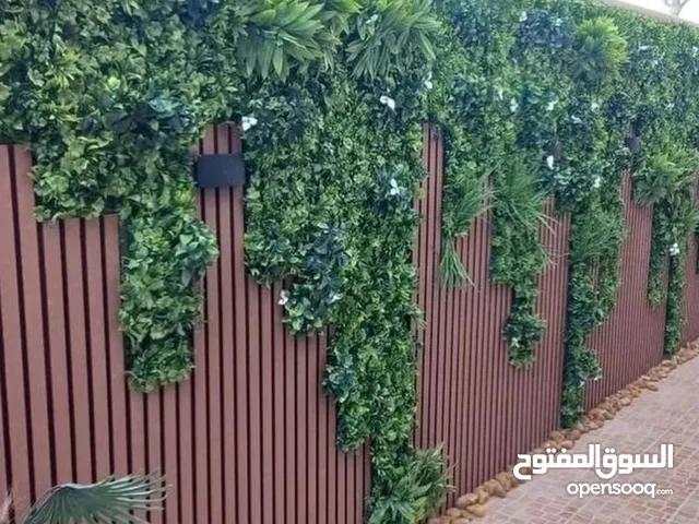 اضاءه وديكورات بديل الخشب مع العشب الوردي والثيل الصناعي ارخص الاسعار