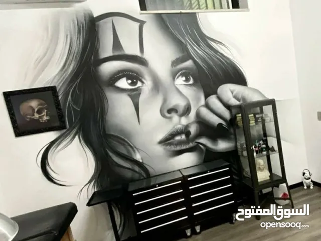 رسام جداريات/ فنان جرافيتي