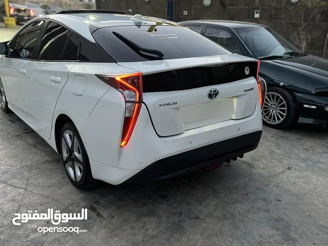 بريوس2018 اعلى صنف مالك اول من الحرةاستخدام شخصي ممشى 100000 كيلو مثبت بلكارسير فحص كامل ولاملاحظة
