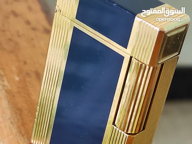 ولاعة ديبون مطلية بالذهب قطعة رائعة جدا