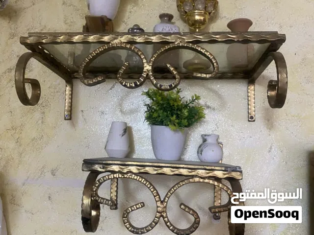 رفوف حديد وقزاز