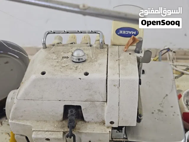 ماكينه خياطه كومبريسر هواء طاولات تفصيل